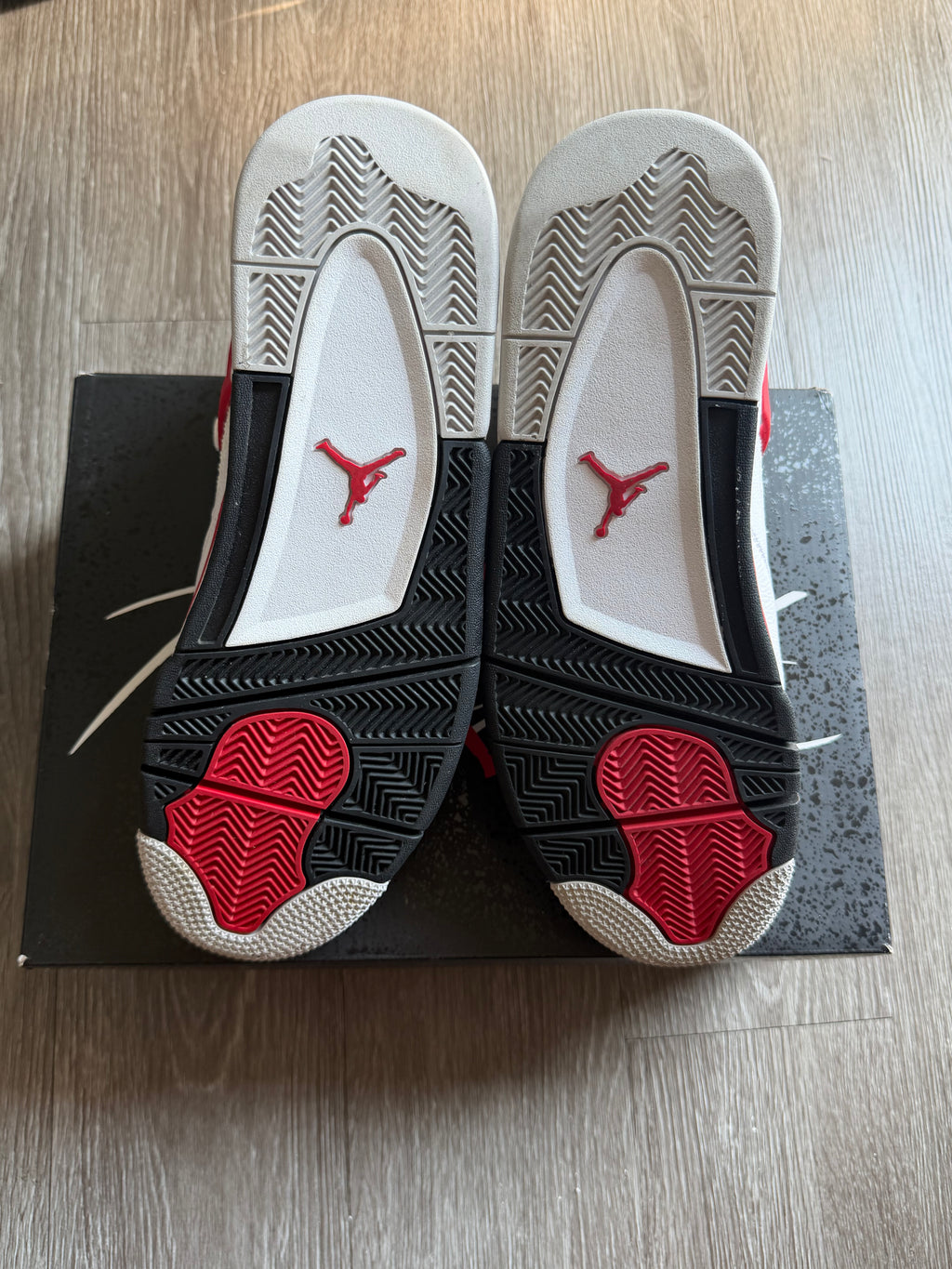Jordan 4 Retro “Red Cement”