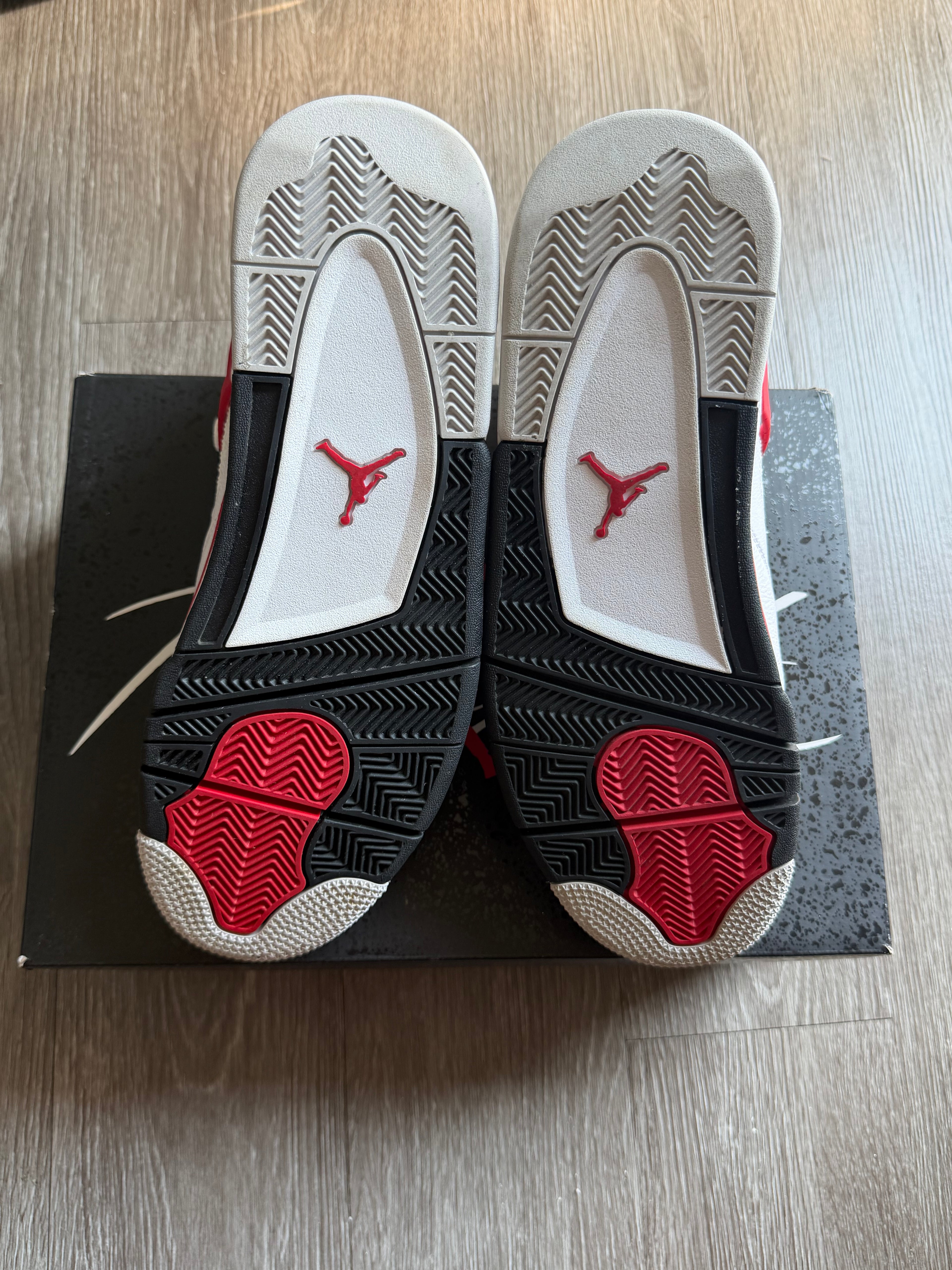 Jordan 4 Retro “Red Cement”