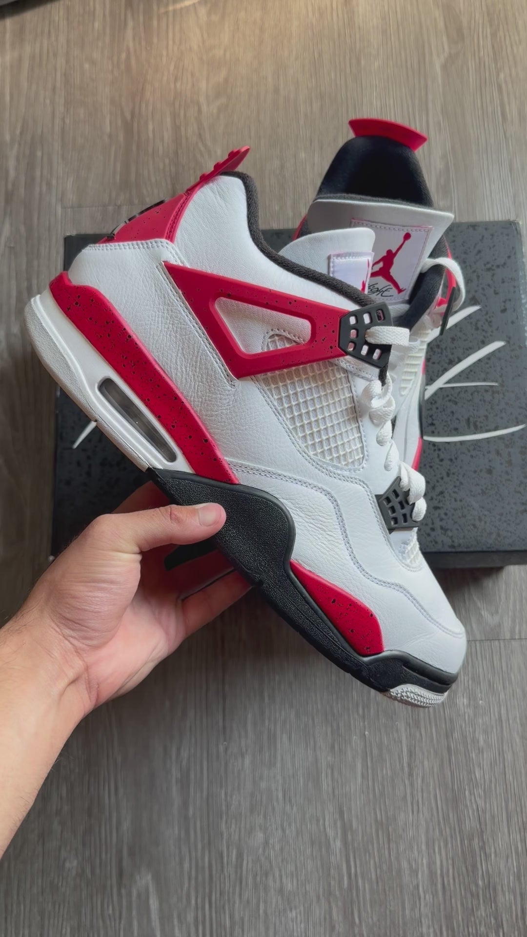 Jordan 4 Retro “Red Cement”